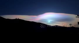 Multi-coloured cloud appears above Chinese city