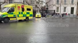 Several ambulances leave London's Downing Street
