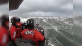 US Coast Guard Surf Crew Tackles Waves During Training Operation In Long Beach, Washington, US