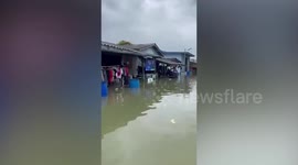 High tide floods coastal homes in southern Thailand