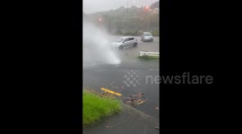 New Zealand storm: Water bursts through road like fountain in Auckland