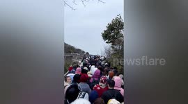 Not my idea of fun: Tourists packed like sardines at China scenic spot