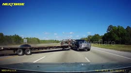 Accident: Truck Loses Control When a Car Tries to Change Lanes