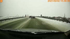 Close Call: Car Almost Collides With Another Vehicle On Icy Road