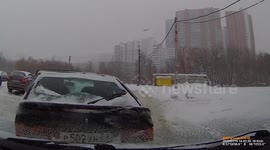 Accident: Car Hydroplaning Causes Crash on an Icy Road