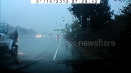 Accident: Slippery Road Causes Black Car to Skid And Collide With Oncoming Vehicle