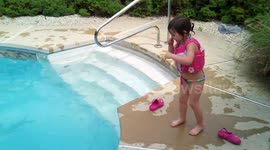 Hilarious video of daughters swimming in pool. Youngest Wipes Out & Recovers.