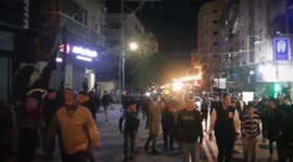 Palestinians in Gaza City celebrate after deadly synagogue shooting in Jerusalem