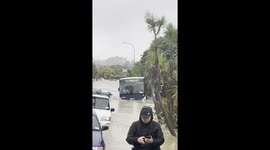 Shocking footage shows bus being swept away during Auckland, New Zealand floods