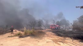 Fire rips through wasteland filled with discarded power lines in Thailand