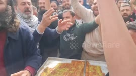 Militants of the Al-Quds Brigades, the military wing of the Palestinian Islamic Jihad Movement, shout slogans at a rally celebrating following reports that  two Israeli shot and wounded in a shooting attack in Silwan neighborhood