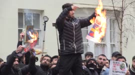 Swedish flag burned during protest outside Embassy of Sweden in London against Quran burning