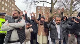 After the burning of the Quran in Sweden,  Militant Islamic groups arrive outside the Swedish Embassy