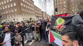 After the burning of the Quran in Sweden,  Militant Islamic groups arrive outside the Swedish Embassy