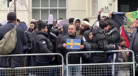 After the burning of the Quran in Sweden,  Militant Islamic groups arrive outside the Swedish Embassy