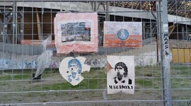 Drawings and banners dedicated to Diego Armando Maradona outside the stadium named after him, before the match of the Italian championship SerieA between Naples - Rome.