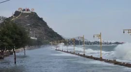 Sea crashes into shore during high tide floods in Thailand