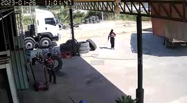 Over-inflated lorry tire explodes at mechanic's repair shop