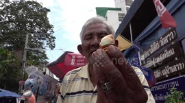 Ice cream man has awesome trick hurling dessert 20ft in the air and catching in cone