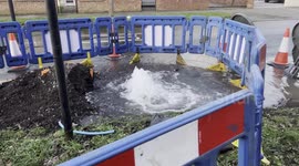 A burst water main in southwest London leaves local residents and businesses without water