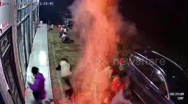 Watch moment a fire pit explodes as people gathered around it to keep warm