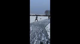 Dog takes lad for walk in snow