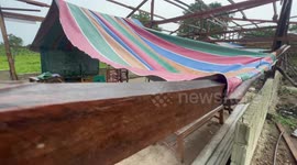 High school students attends class despite of heavy rains, dilapidated and unfinished school building