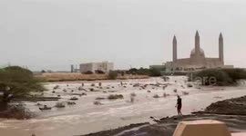 Flash flood passes outside worker's home in Oman