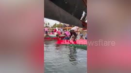 Teachers and schoolchildren plunge into sea when pier collapses in Malaysia