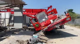 Crane topples over damaging homes in Thailand