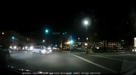 Reckless Driving: Silver Car Tries to Make a Illegal Turn and Gets Sideswiped