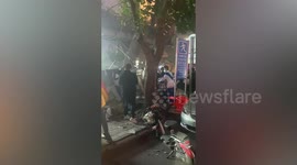 Canopy knocked down by falling hotel bricks strikes pedestrians, killing 1