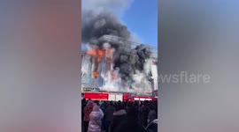 Huge fire bursts out of mall in northern China
