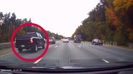 Close Call: Pickup Truck Brake Check Almost Causes an Accident