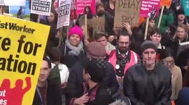 Jeremy Corbyn seen amongst thousands of striking workers outside Downing Street
