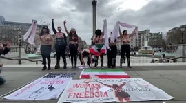 Topless women protest against Iranian regime in Trafalgar Square, London