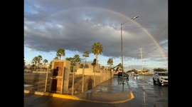 Full rainbow over Hermosillo in Mexico during the cold winter