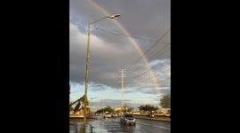 Full rainbow over Hermosillo in Mexico during the cold winter