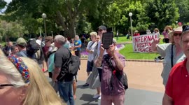 Protesters heckle as funeral procession of Cardinal George Pell departs St Mary’s Cathedral in Sydney, Australia