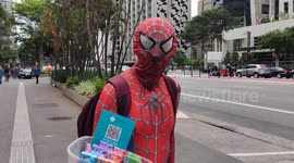 Man dressed as Spider-Man sells candy to survive in Sao Paulo, Brazil