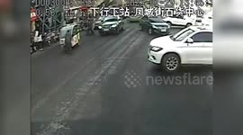 Heroic bus driver runs to stop mobility scooter sliding down road in China