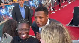 Actor Jonathan Majors takes selfies with fans at premiere of 'Ant-Man and the Wasp: Quantumania' in Sydney, Australia