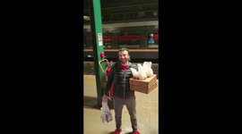 Only in Italy: Hungry colleagues have pizzas delivered to them while travelling on train