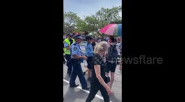 Protester arrested at George Pell’s funeral In Sydney