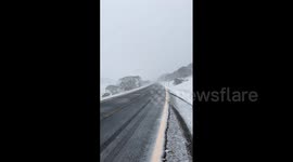 Summer snow falls in parts of NSW and Victoria, Australia