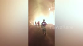 Firefighters flee through raging forest blaze as 14 die in fires across Chile