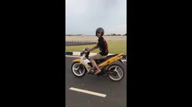 Ouch! Malaysian lad's motorbike stunt goes wrong, with painful results for him and his bike