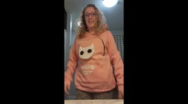 A talented designer created a cozy pet carrier hoodie