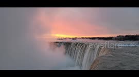 Beautiful sunrise over Niagara Falls on the coldest day of the year during a frigid polar vortex