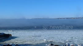 Cold artic blast Marblehead Massachusetts ice pancakes on sea smoke